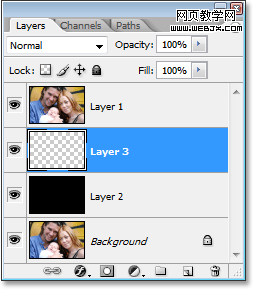 photoshop's layers palette showing the new blank layer between layer 1 and layer 2.